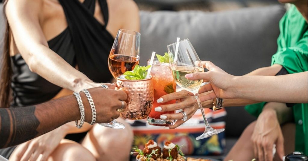 Photo by Denys Gromov: https://www.pexels.com/photo/friends-drinking-cocktails-on-a-terrace-12645171/
