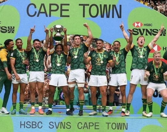 The Blitzbokke hold up the winning trophy at the HSBC SVNS in Cape Town in December 2025